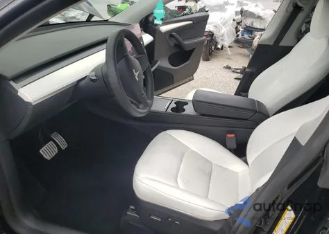 2023 Tesla Model Y from USA, damaged, VIN 7SAYGDEF1PF803207